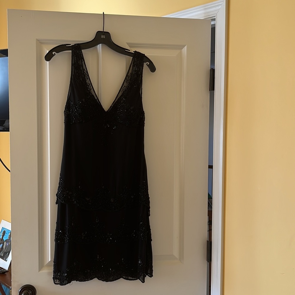 Black sequins dress. Size 8 ( no tags ), Like New